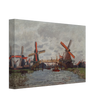 Windmills near Zaandam by Claude Monet