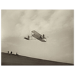 The Wright brothers glider in flight.
