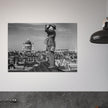 Second World War historic black and white photograph. Aircraft spotter on a roof in London.
