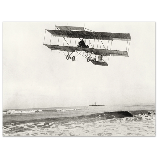 Vintage aircraft M. Van den Born flying above the sea Old photograph reproduction.