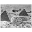 Air Transport command plane flies over the pyramids in Egypt 1943. World War 2
