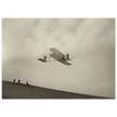 The Wright brothers glider in flight.