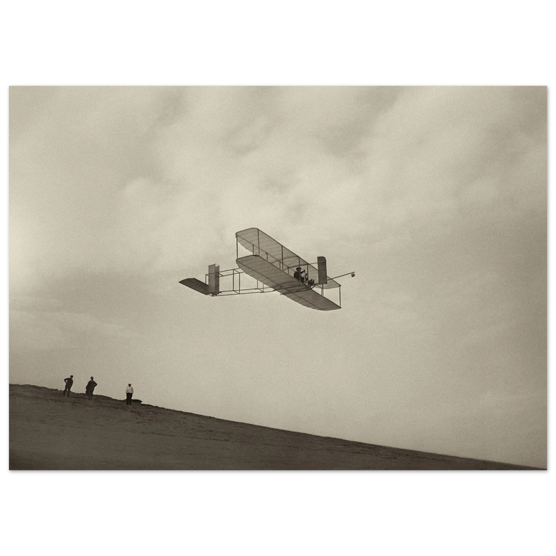 The Wright brothers glider in flight.