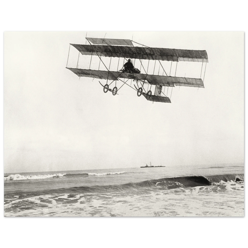 Vintage aircraft M. Van den Born flying above the sea Old photograph reproduction.