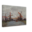 Windmills near Zaandam by Claude Monet
