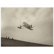 The Wright brothers glider in flight.