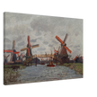Windmills near Zaandam by Claude Monet