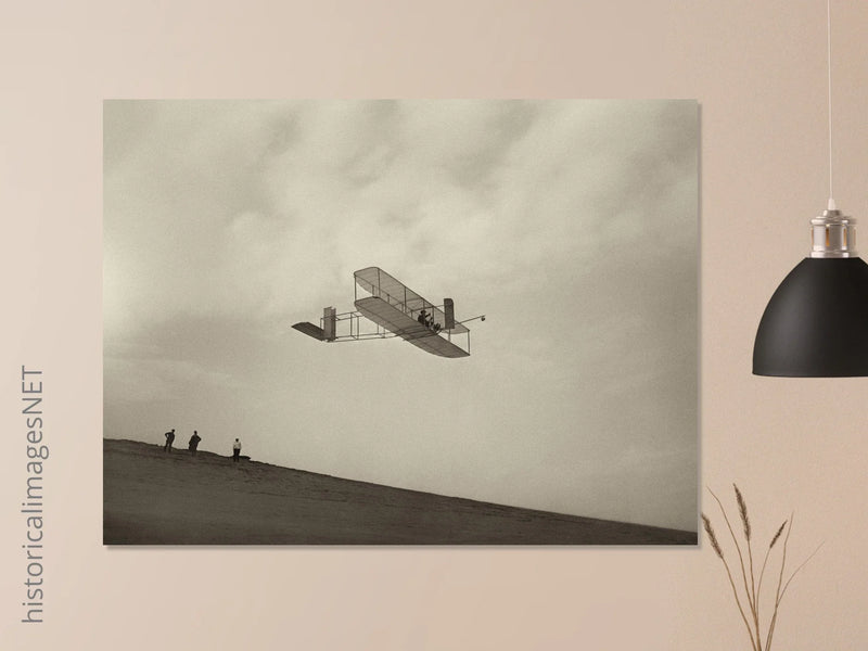 The Wright brothers glider in flight.