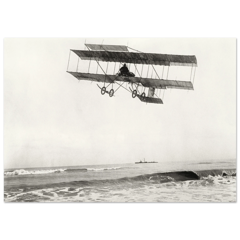Vintage aircraft M. Van den Born flying above the sea Old photograph reproduction.