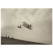 The Wright brothers glider in flight.