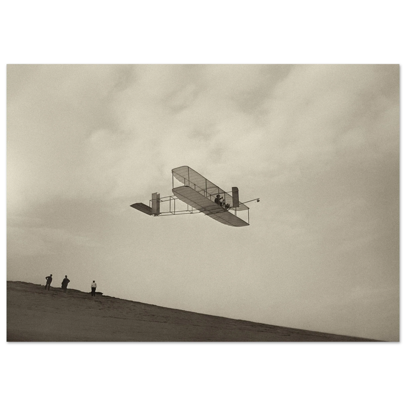 The Wright brothers glider in flight.