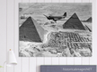 Air Transport command plane flies over the pyramids in Egypt 1943. World War 2