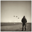 Airman standing in airfield in Italy 1945. Fine art black and white toned print