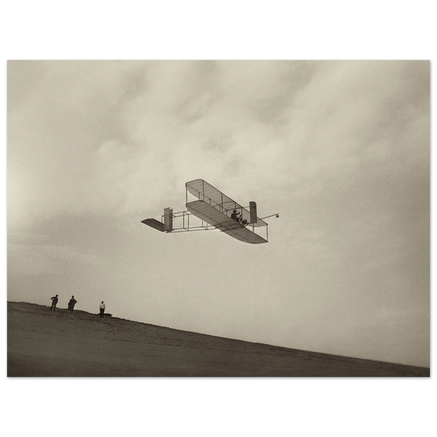 The Wright brothers glider in flight.