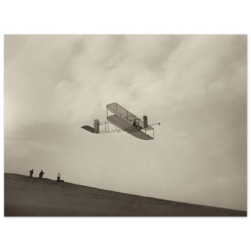 The Wright brothers glider in flight.