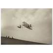 The Wright brothers glider in flight.