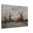 Windmills near Zaandam by Claude Monet