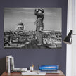 Second World War historic black and white photograph. Aircraft spotter on a roof in London.