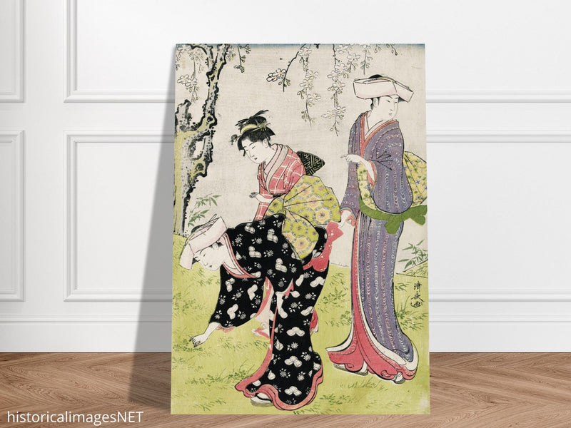 Two women and a girl under a blossoming cherry tree by Torii Kiyonaga XVIII Century Woodblock print reproduction .
