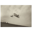 The Wright brothers glider in flight.