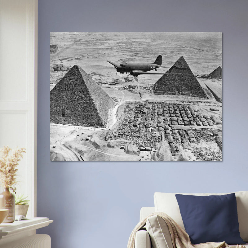 Air Transport command plane flies over the pyramids in Egypt 1943. World War 2