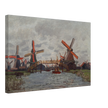 Windmills near Zaandam by Claude Monet