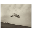 The Wright brothers glider in flight.