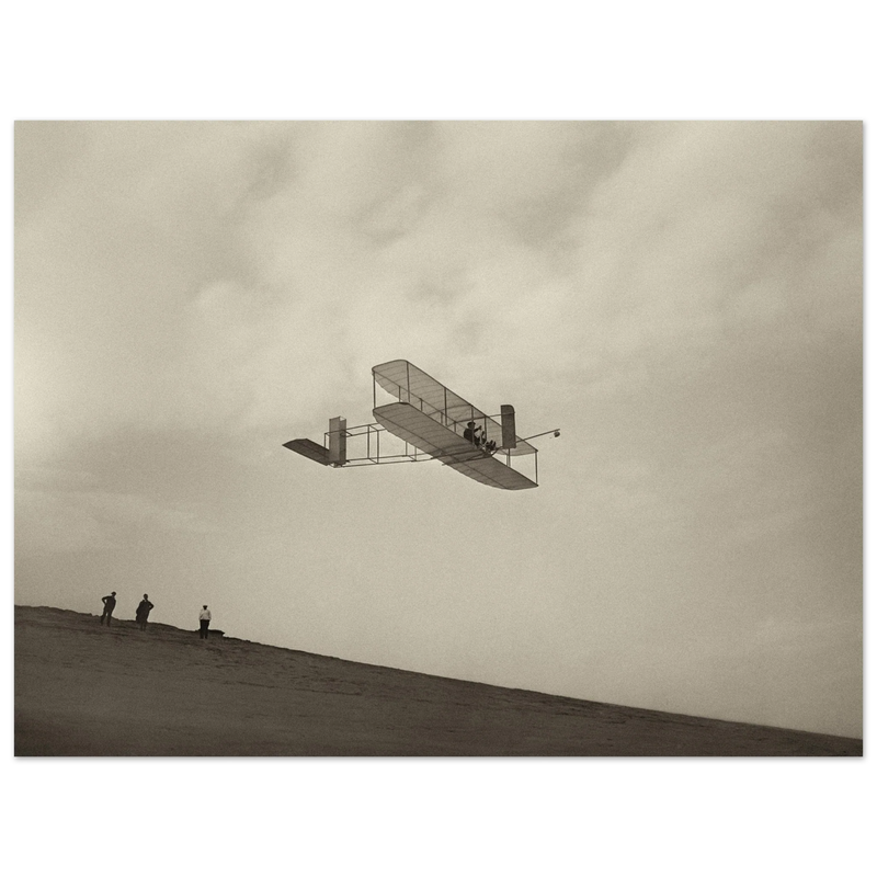 The Wright brothers glider in flight.