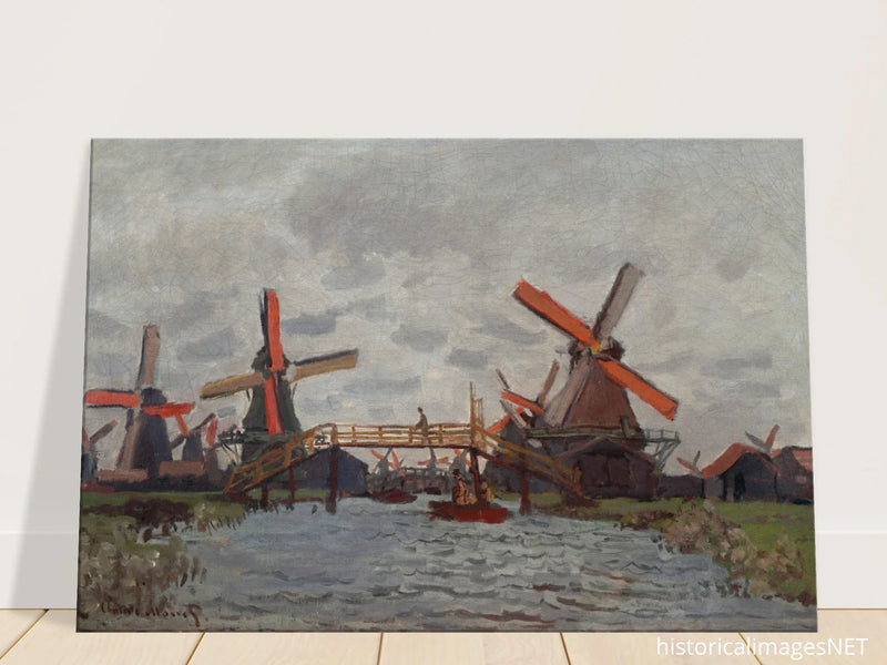 Windmills near Zaandam by Claude Monet