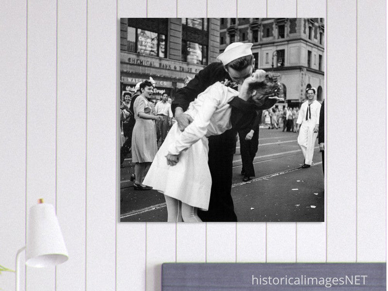 Kiss in New York city. Crowds celebrate in New York City streets after ending of World War 2 .