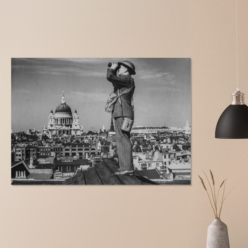 Second World War historic black and white photograph. Aircraft spotter on a roof in London.