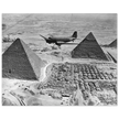 Air Transport command plane flies over the pyramids in Egypt 1943. World War 2