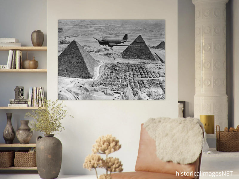 Air Transport command plane flies over the pyramids in Egypt 1943. World War 2