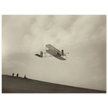 The Wright brothers glider in flight.