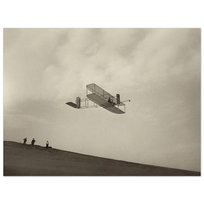 The Wright brothers glider in flight.