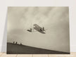 The Wright brothers glider in flight.