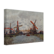 Windmills near Zaandam by Claude Monet