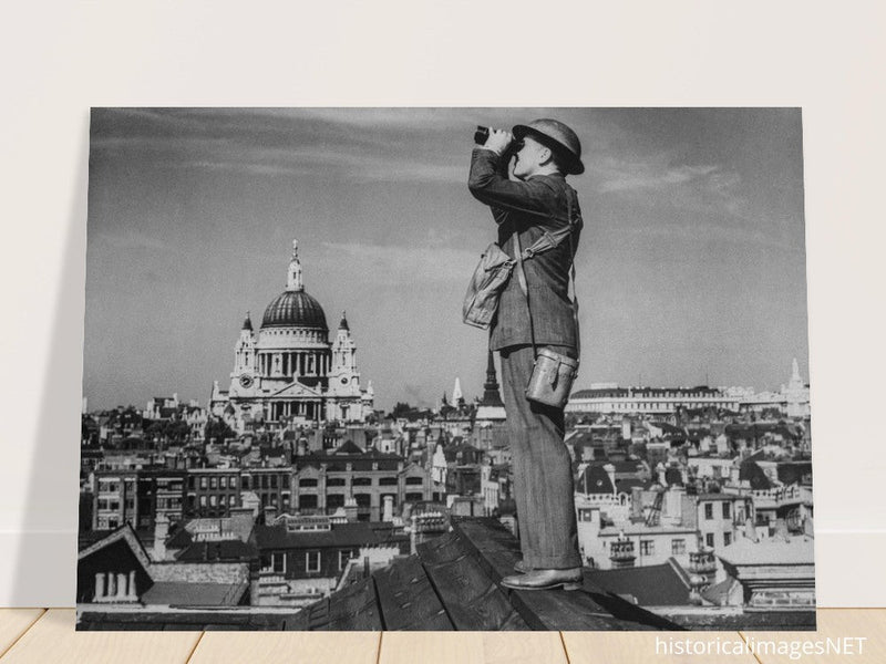 Second World War historic black and white photograph. Aircraft spotter on a roof in London.