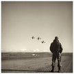 Airman standing in airfield in Italy 1945. Fine art black and white toned print